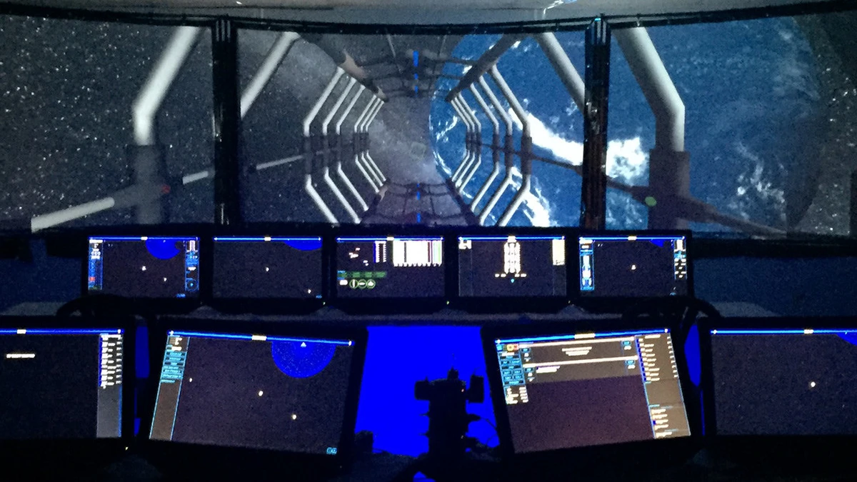 A futuristic starship cockpit with multiple control displays, looking out toward a blue planet and outer space.